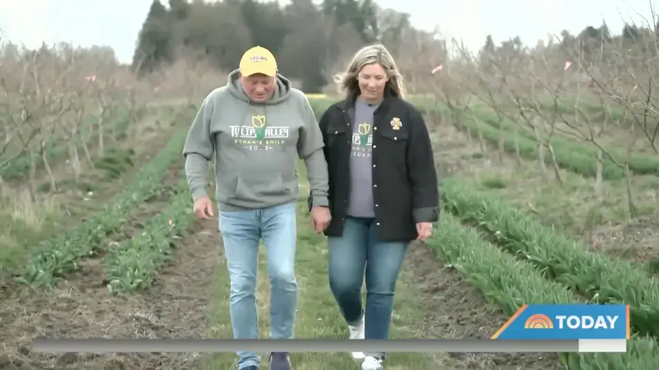 Jim And Stacy Chapin Walk Through The Tulip Fields Where Their Son Used To Work.