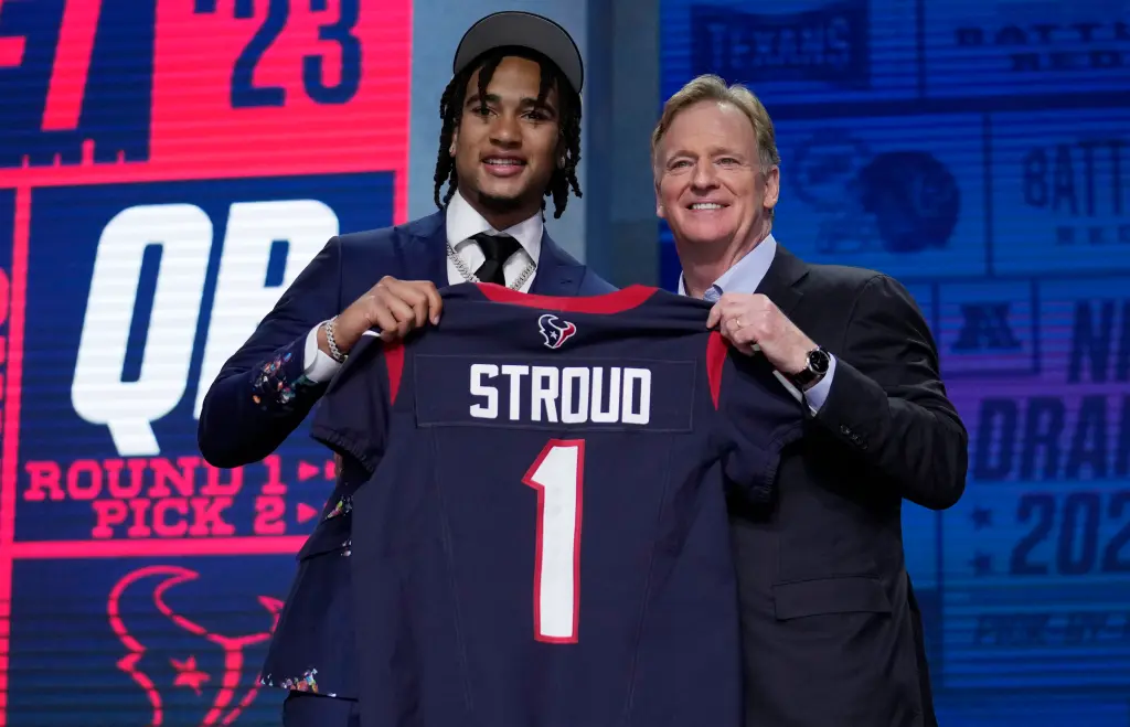 Quarterback C.J. Stroud poses for a picture with NFL Commissioner Roger Goodell after being selected as a No. 2 pick by the Texans.