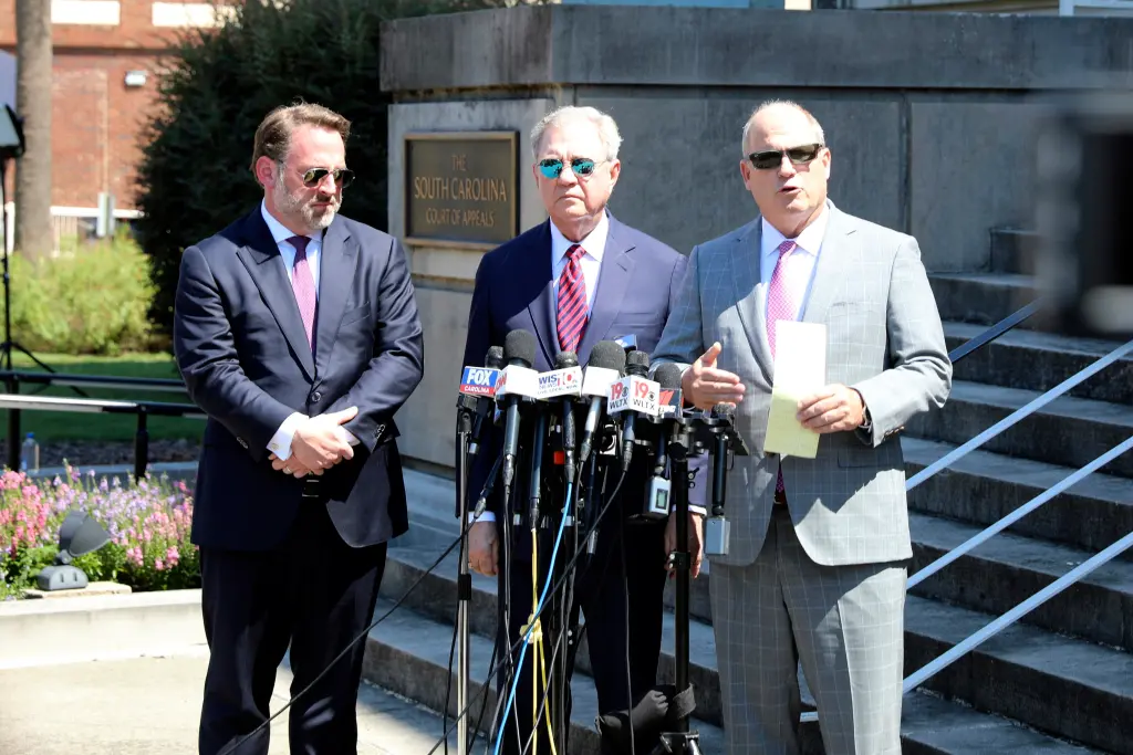 Murdaugh’s attorneys Phillip Barber (from left), Dick Harpootlian, and Jim Griffin speak at a news conference after filing an appeal of Murdaugh’s double murder conviction on September 5 in Columbia, SC