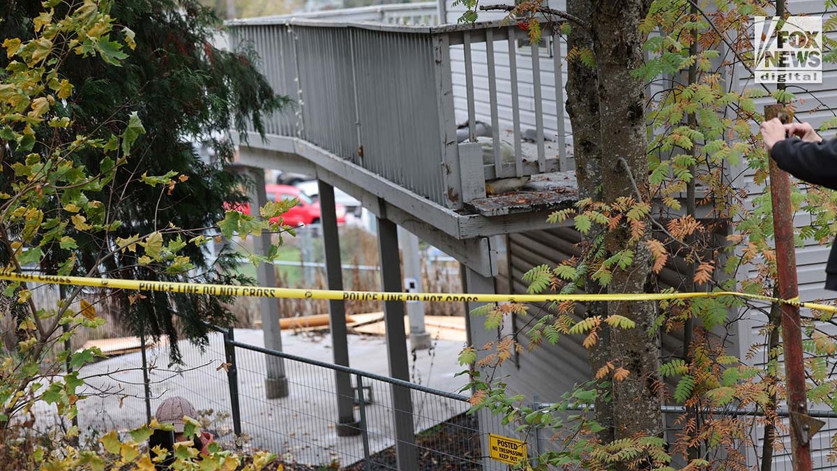Investigators set up outside the home where four University of Idaho students were slain in November last year